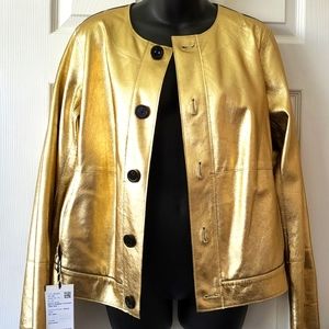 New with tags reversible gold to black leather jacket.